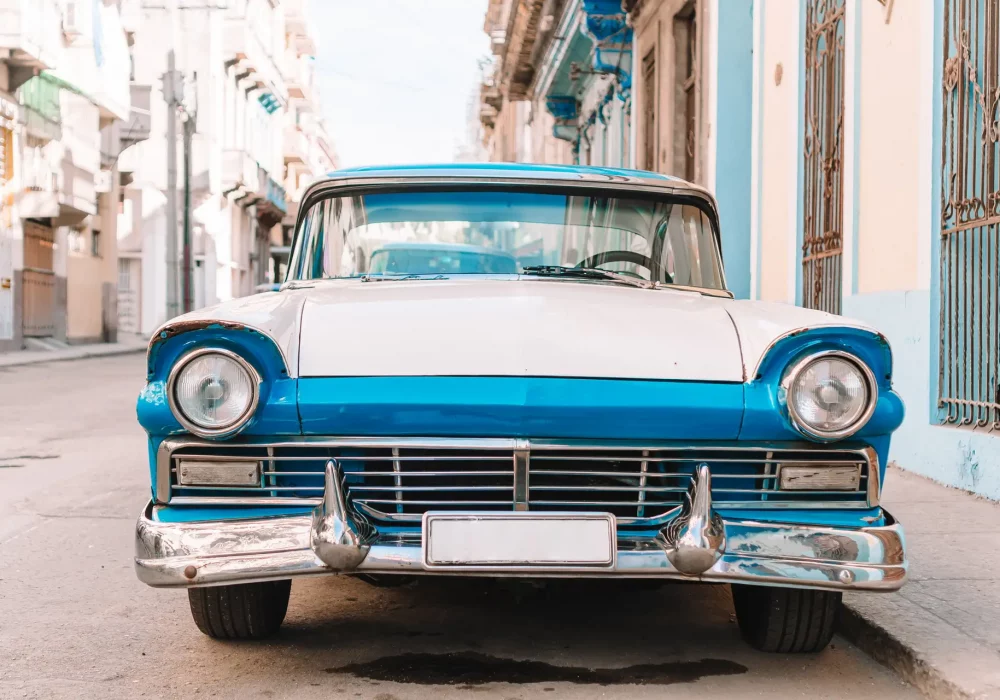 View of yellow classic vintage car in Old Havana, Cuba